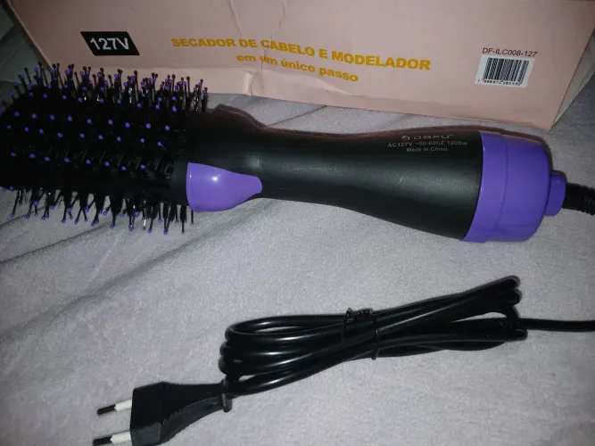 Escova modeladora R$ 100