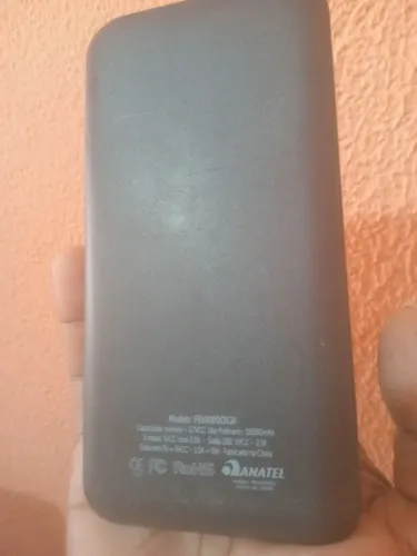Carregador portátil carrega por indução e com cabo USB 