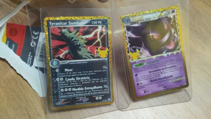 Cartas pokemon gangar e tyranitar