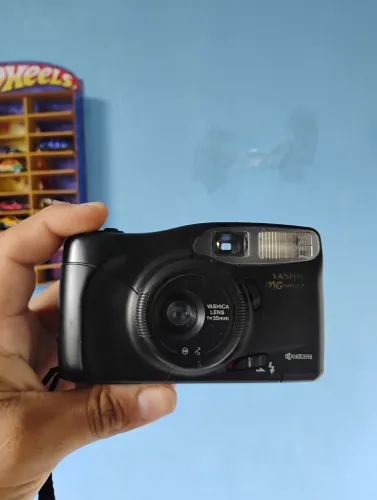 Camera analógica yashica MG motor leia a descrição do anúncio