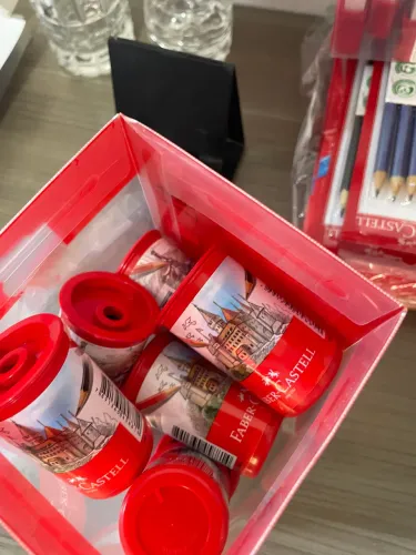 12 Apontadores Tubo Faber Castell com depósito