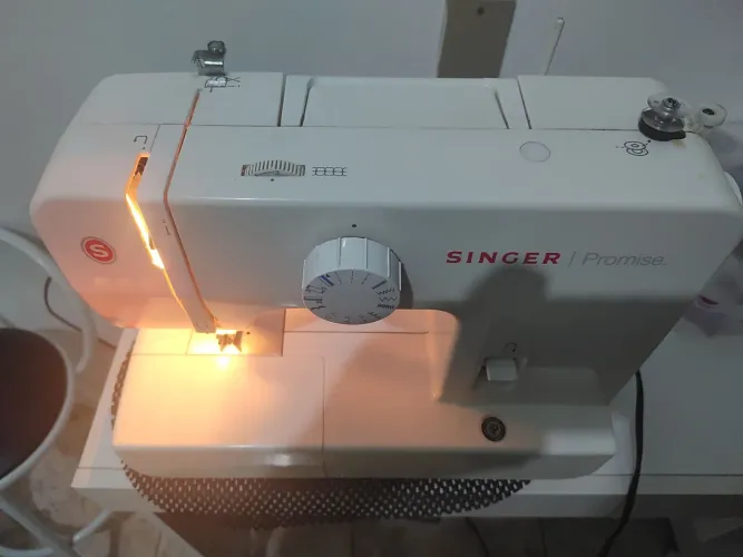 máquina de Singer ptomisso