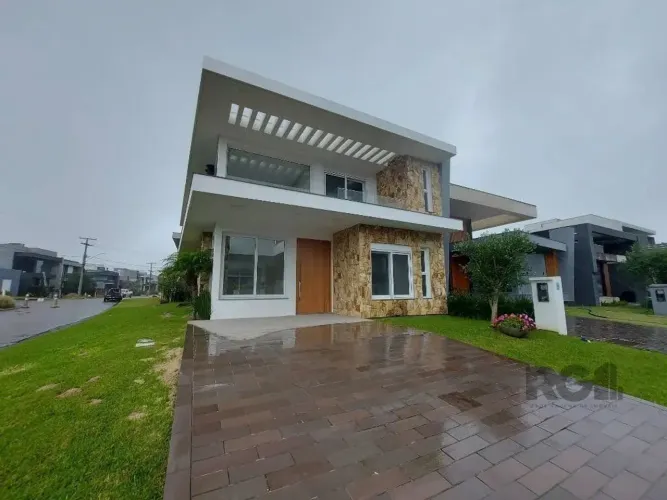 Casa de Condomínio em Atlântida Sul