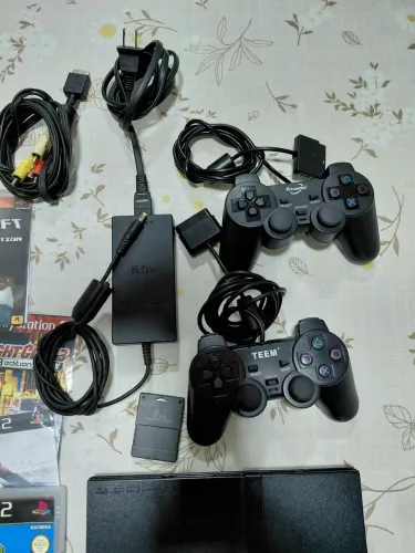 Vendo PS2 completo e conservado