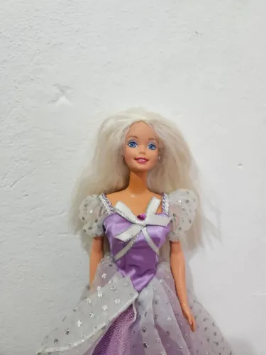 Lote com três Barbie