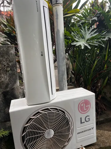Split LG inverter V 9 mil btus.