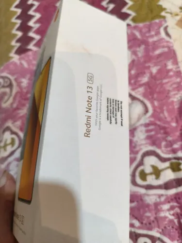 Vendo celular Redmi 13