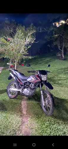 Vendo Moto revisada,muito conservada.