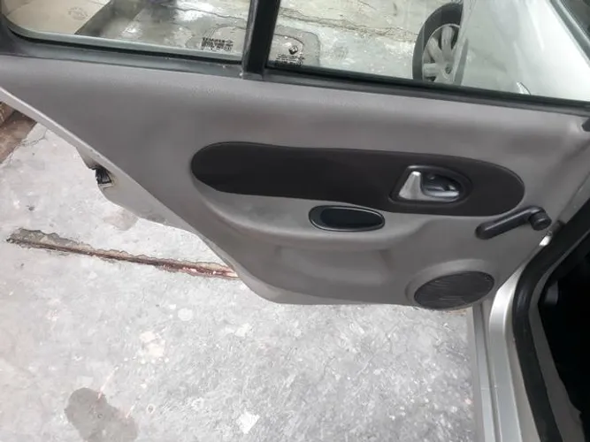 Forro de porta traseiro renault symbol 2014
