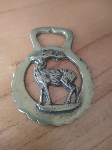 Antigo abridor de garrafas