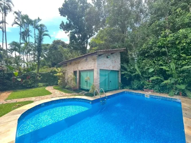 Casa de 377m² 6 quartos, 5 suítes, com piscina na Riviera São Loureço Módulo 22 Bertioga S