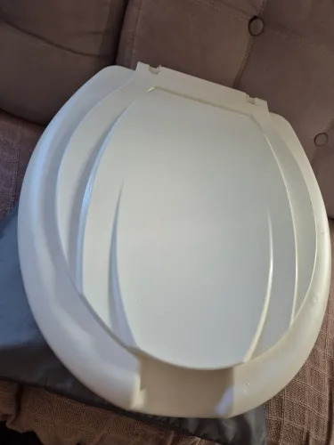 Tampa de vaso sanitário elevado