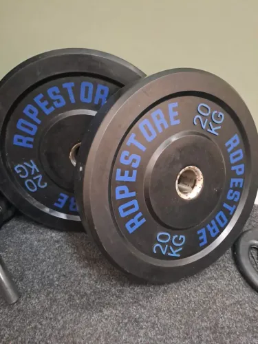 2 Anilhas olímpicas de 20kg cada