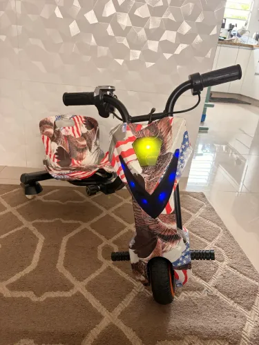 Triciclo Elétrico Rolimã Infantil