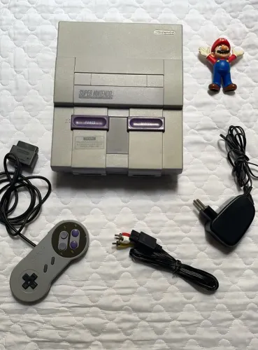  Super Nintendo Fat. Acompanha o que está na foto. **1**