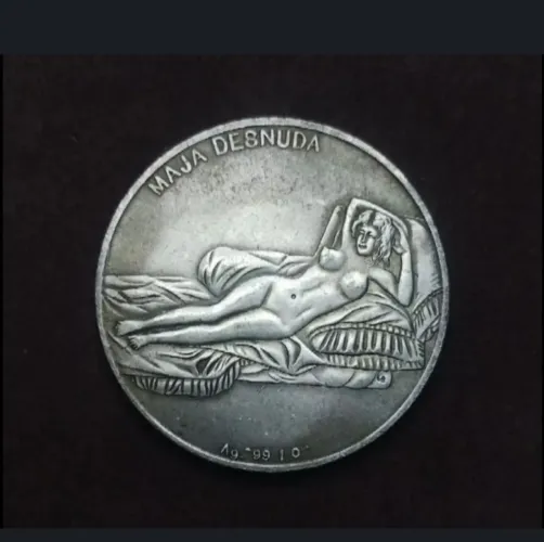 Moeda ou medalha de Leonardo da Vince e naja desnuda??