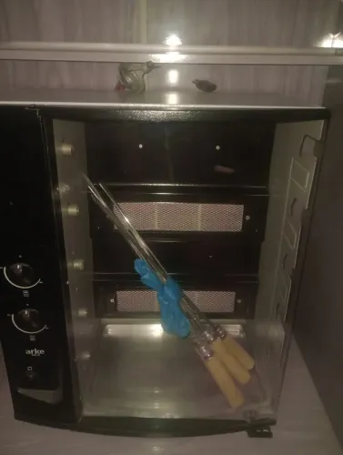 Churrasqueira a gás com 5 espetos giratório