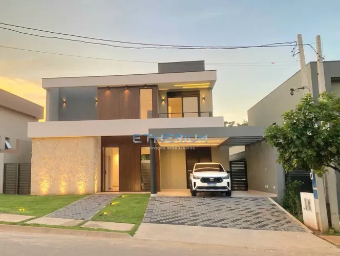 Sobrado alto padrão, possui 4 suites com varanda, piscina e paisagismo á venda no Condomín
