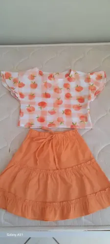 Conjunto Blusa e Saia de Pêssego para Menina
