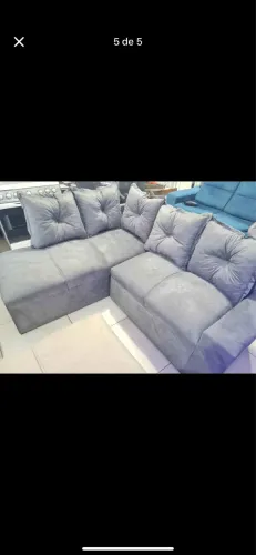 Sofá de canto cinza confortável