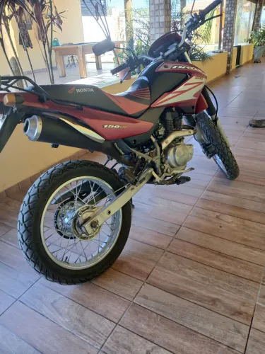 Ola moto esta em santa Isabel, moto documentos nada q desabone 