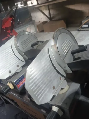 Cortador de frios. Moedor de carne e cilindro