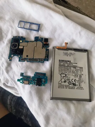 Vendo placa mãe do a21s original perfeita mais placa de carga mais a bateria original