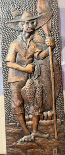 quadro de cobre representando pescador 