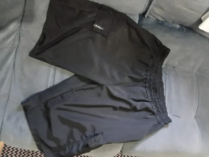 Bermuda Tactel tamanho 38 e blusa polo tamanho super conservadas por R$30,00