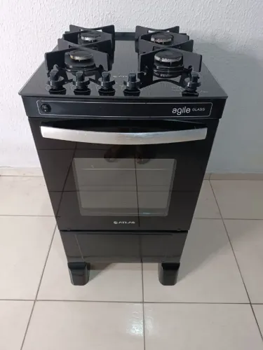 Fogao atlas 4 bocas manual mesa de vidro muito bem conservado e funcionando tudo!