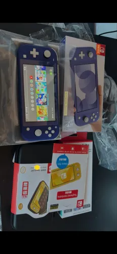 Nintendo switch lite desblck novo na caixa com acessórios