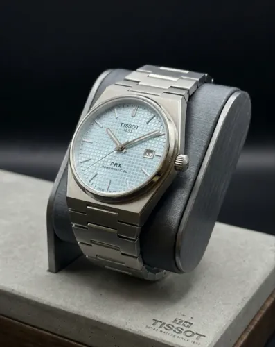 Relógio Tissot PRX - Automático - Azul Claro - 40mm - Fundo Transparente - Prm AAA+
