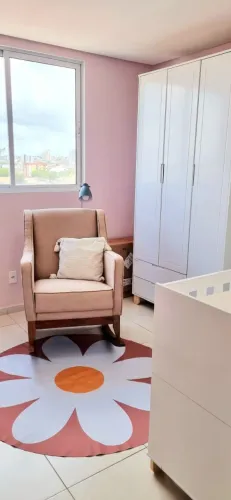 Poltrona de amamentação com balanço