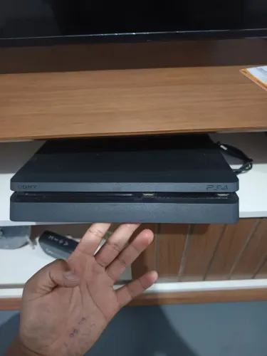 Play 4 slim 1 TB  R$1.350