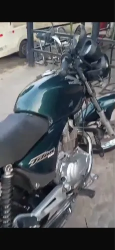 Vendo titan 150 2005 freio a disco a partida moto está zera só pegar e andar