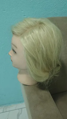 Cabeça de boneca para penteados