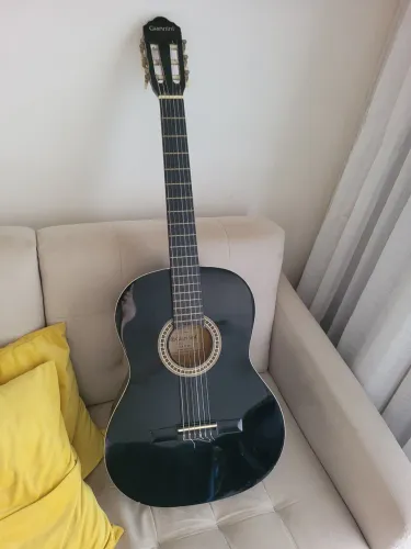 Violão acústico de nylon Giannini GCX-15 na cor preta. 