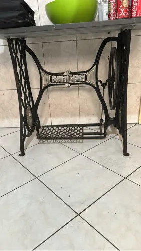 Pé de máquina Singer
