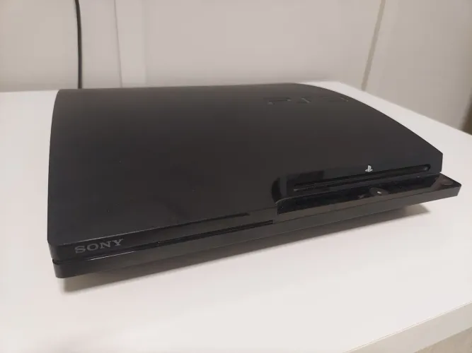 PS3 Slim 110V 1 controle e jogos 