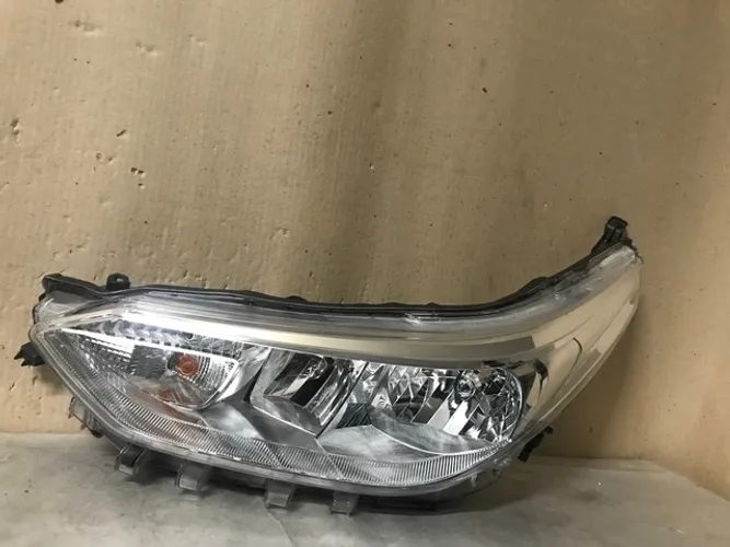 Farol Toyota Yaris (cromado ) manual