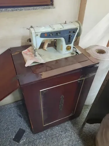 máquina de costura singer antiga