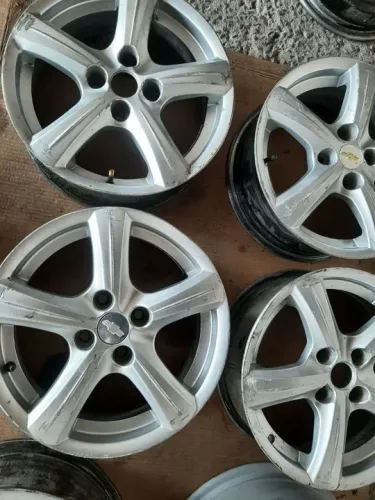 Roda aro 15 Chevrolet estrela prata 4x100 jogo usadas 