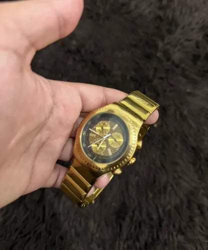Relógio Swatch 007 série ouro 