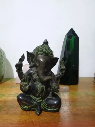 estatua hindu de metal ganesha