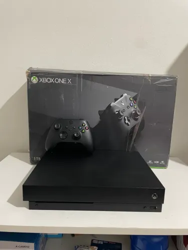 Xbox one x - 1 terá - SEMI NOVO