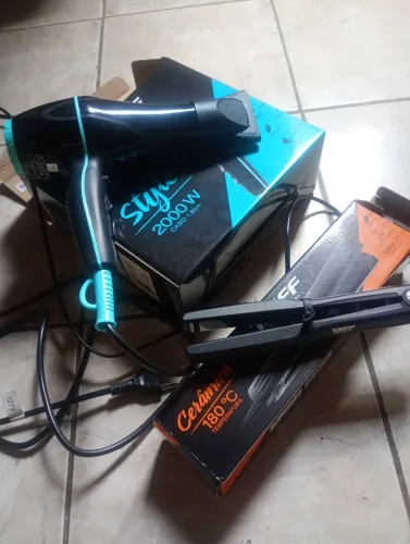 Vendo secador e prancha da TIFF novos, interessados só chamar