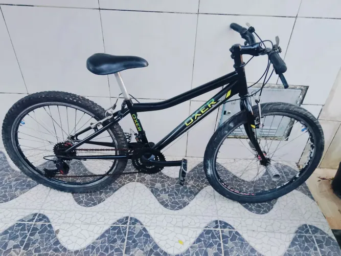 Bicicleta oxer aro 24 semi nova completa com marcha e rolamento raios inox calha aeros 