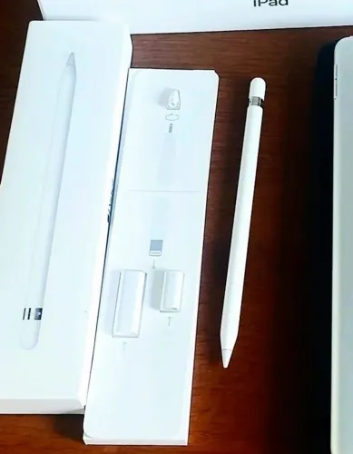 Apple pencil 1°geração com pontas extras lacradas na caixa.