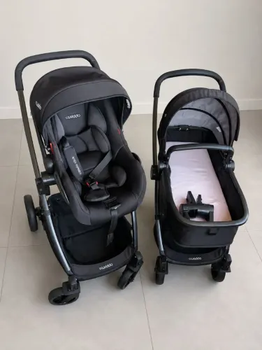 Carrinho de bebê com Moisés e bebê conforto Kiddo
