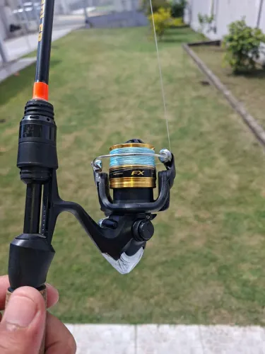 Molinete shimano fx 1000 +vara angler 12lb
